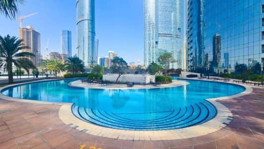 Апартаменты Cozy 1Br In Iconic Tower Абу-Даби Экстерьер фото